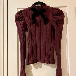 NWT Zara burgundy knit with black velvet bow. Size M.